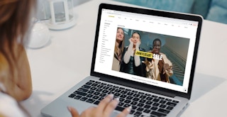 a person looking at the nordstrom anniversary sale on their macbook