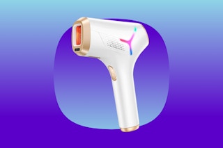 A white and gold laser hair remover with a multi-color logo. It has a large contact window.