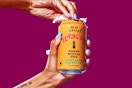 Stock image of the De La Calle Tepache, Mandarin (12 ounce can being opened)