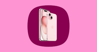an iphone 15 up against a pink background