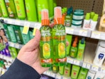 hand holding garnier hair care in walgreens