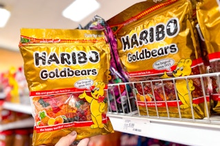 hand holding a bag of haribo goldbears at target