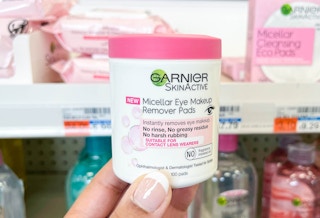 hand holding one garnier skinactive micellar eye makeup remover pads