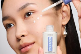 a woman using loreal collagen serum