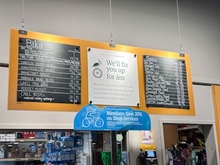 rei bike shop signage in store 