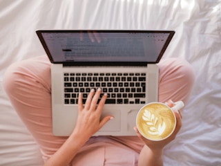Person on laptop opened on nielsen website