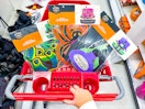 3 target trunk or treat kits sitting in a target cart