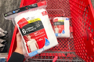 hand holding a 6-pack of men's tees over a target cart