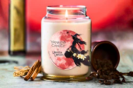Yankee Candle with a witch (Hallween-themed)