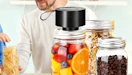 a mason jar sealer on a mason jar full of fruit