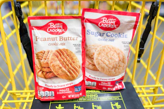 hand holding betty crocker cookie mixes