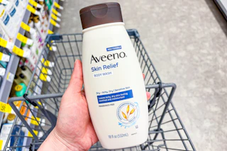 hand holding aveeno skin relief body wash in walgreens
