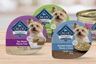 three trays of wet dog food 