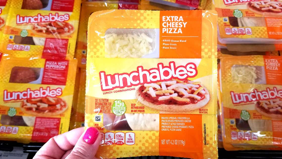 hand holding lunchables