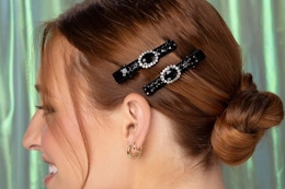 a woman wearing scunci hair clips