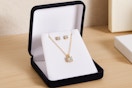 a yellow gold necklace and earring set