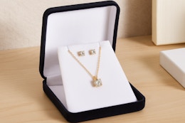 a yellow gold necklace and earring set
