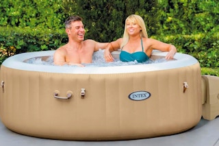 a couple sitting in a tub