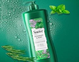 a green bottle of hair conditioners