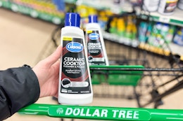 hand holding carbona ceramic cooktop cleaner above dollar tree cart