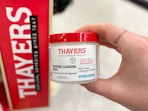 hand holding thayers blemish clearing pads in walgreens