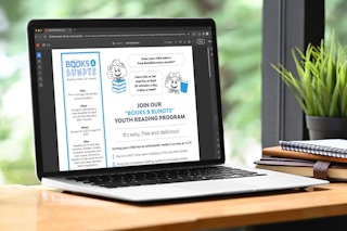 a laptop showing the reading tracker PDF from the Books for Bundts reading program