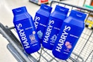 4 bottles of harrys body wash in a cart