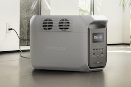 EF ECOFLOW Portable Power Station DELTA 3 1500 on a wood floor ground.