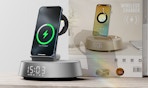 a phone sitting on an alarm clock charging station