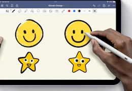 a person using a stylus pen on an iPad