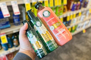 hand holding herbal essences hair care