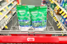 2 bags of floss picks in a cart