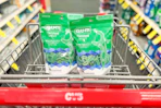 2 bags of floss picks in a cart