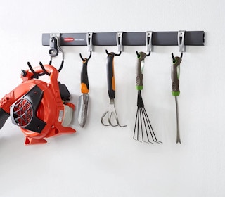 hook wall organizer with gardening tools