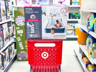 intex queen air mattress sitting on a target cart
