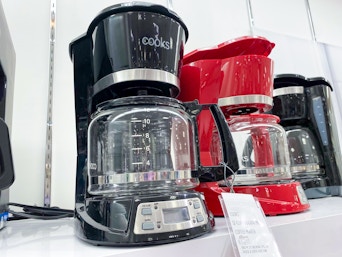 coffee maker on shelf