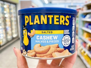 hand holding planters cashews