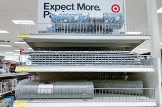 clearance rugs sitting on a target shelf