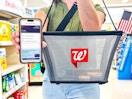 someone shopping at Walgreens carrying a shopping basket