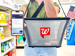 someone shopping at Walgreens carrying a shopping basket