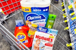 shopping cart with tide, charmin, garnier, huggies, nature made, crest