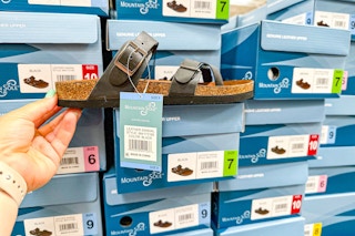 person holding a sandal