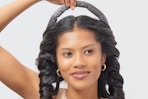 a woman using the kitsch heatless curler