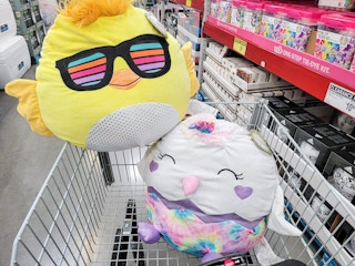 stuffed animals in a cart