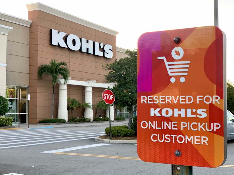 A sign in the parking lot outside of a Kohl's store that reads "Reserved for Kohl's Online Pickup Customer".