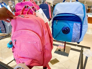 blue and pink kipling backpacks