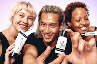 three people, each holding up a product from the inky list