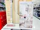 In-store display of the Sharper Image Stick Vacuum