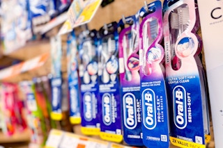 oral-b toothbrushes hanging on a store shelf