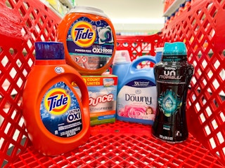 tide, downly, and bounce laundry products in a target cart